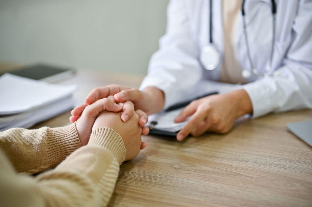 A therapist providing comforting support during outpatient treatment in New Jersey